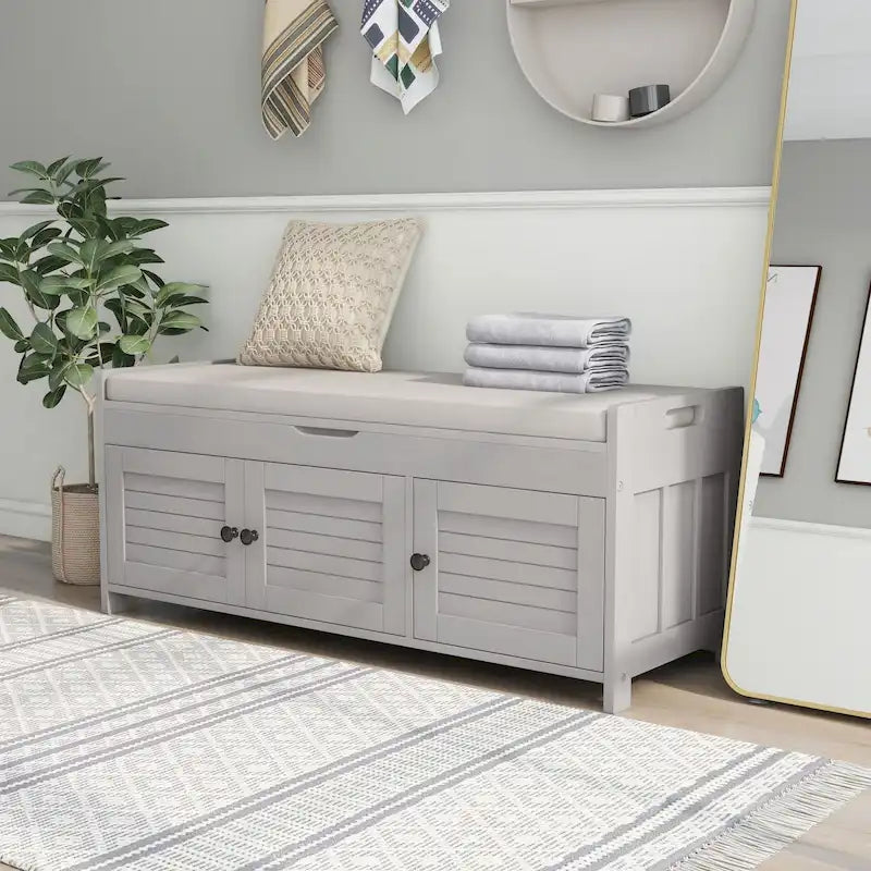 Banc de rangement en bois avec assise rembourrée et portes à persiennes