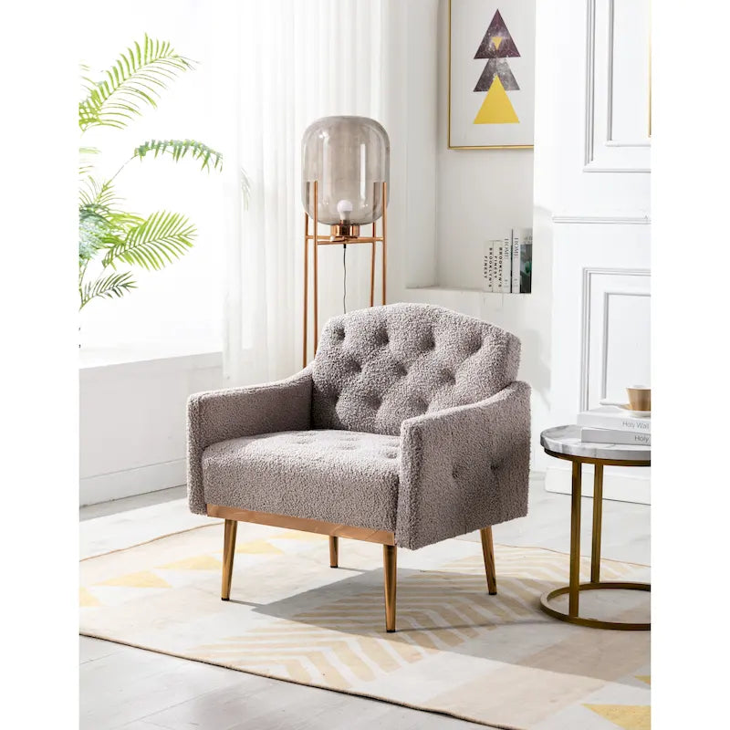 Fauteuil capitonné en peluche avec pieds or rose