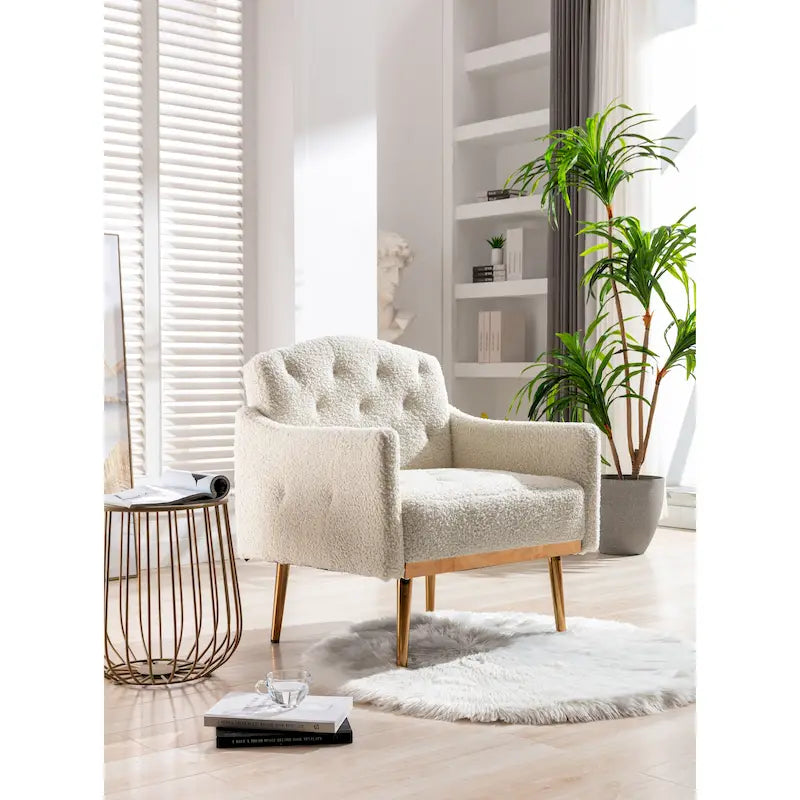 Fauteuil capitonné en peluche avec pieds or rose