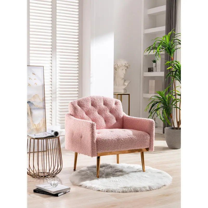 Fauteuil capitonné en peluche avec pieds or rose