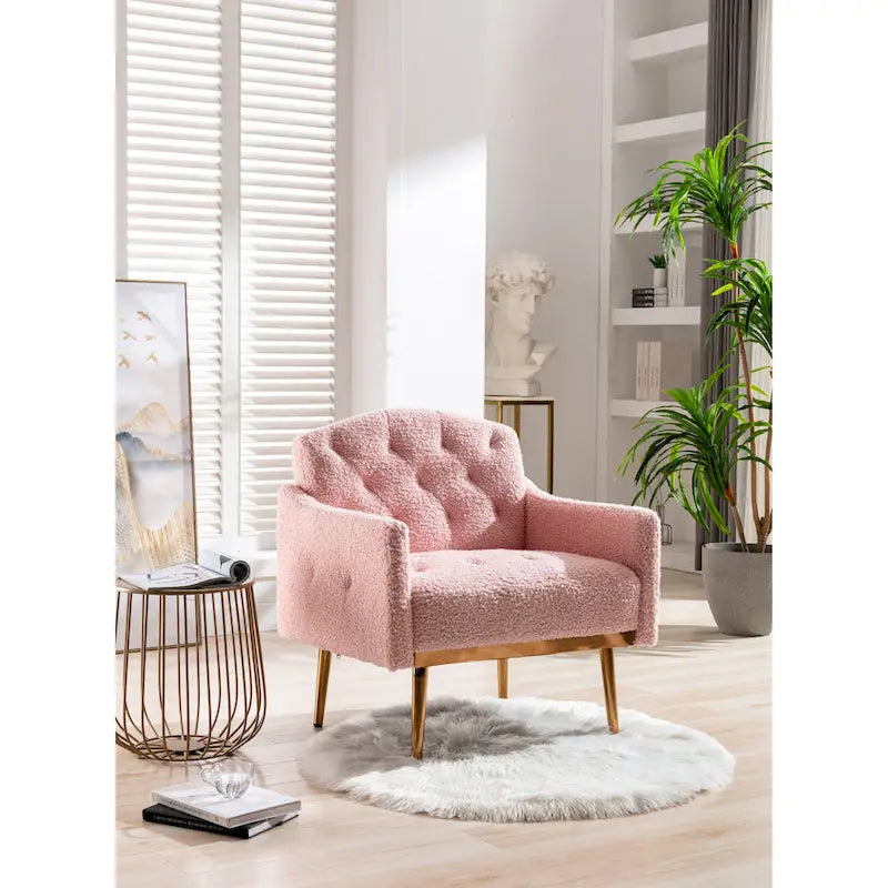 Fauteuil capitonné en peluche avec pieds or rose