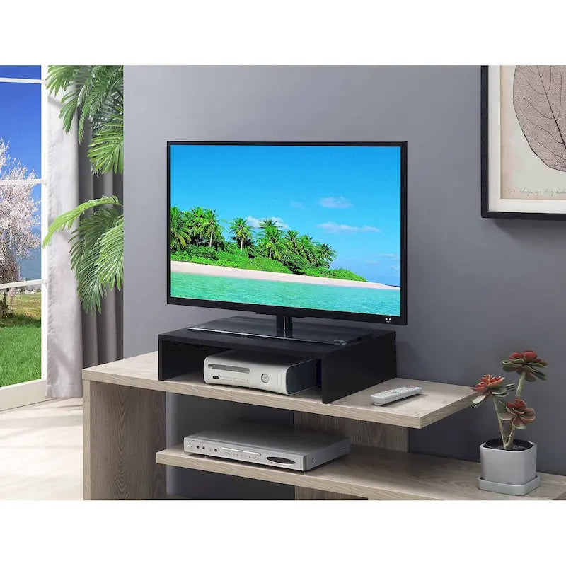 Rehausseur TV/moniteur compact et pratique, adapté aux téléviseurs jusqu'à 26 pouces.
