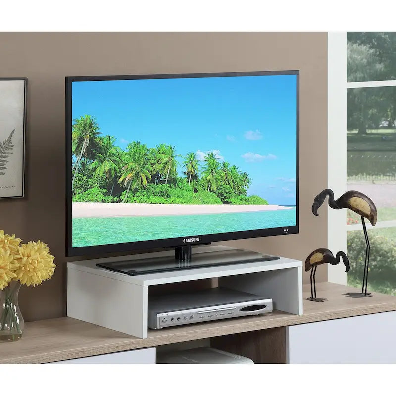 Rehausseur TV/moniteur compact et pratique, adapté aux téléviseurs jusqu'à 26 pouces.