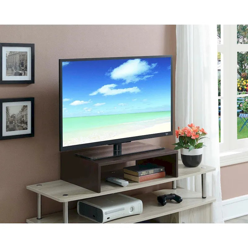 Rehausseur TV/moniteur compact et pratique, adapté aux téléviseurs jusqu'à 26 pouces.