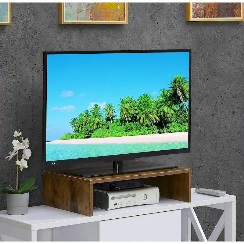 Rehausseur TV/moniteur compact et pratique, adapté aux téléviseurs jusqu'à 26 pouces.