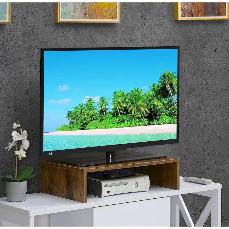 Rehausseur TV/moniteur compact et pratique, adapté aux téléviseurs jusqu'à 26 pouces.