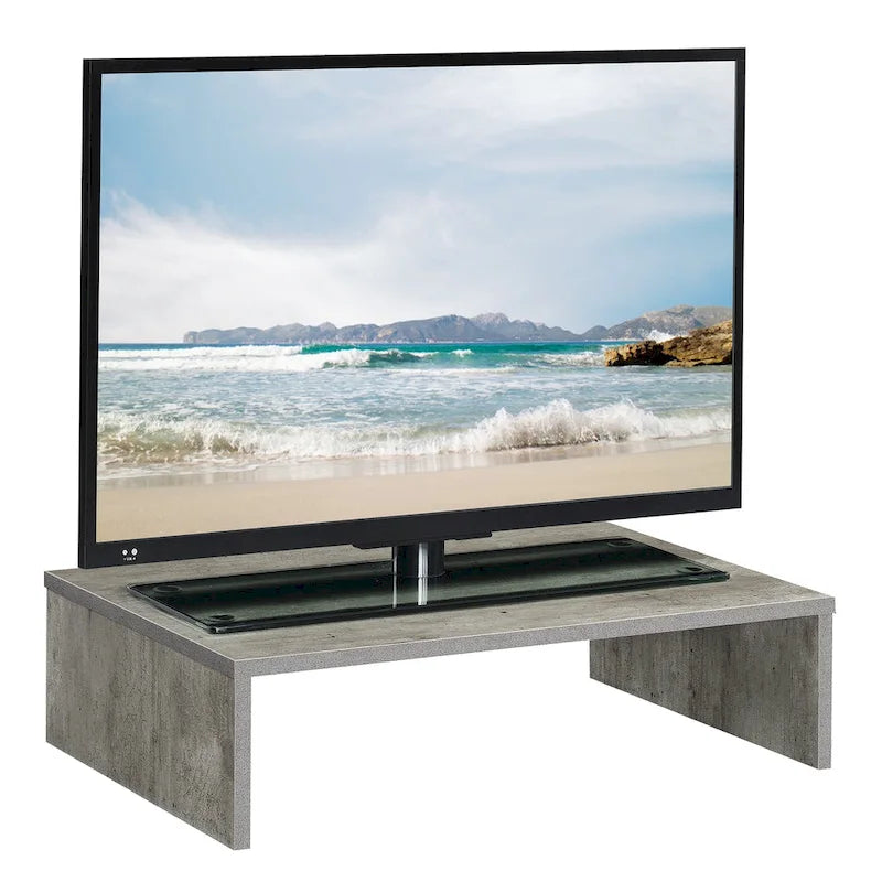 Rehausseur TV/moniteur compact et pratique, adapté aux téléviseurs jusqu'à 26 pouces.
