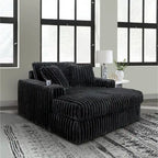 Fauteuil inclinable très grand avec porte-gobelets et ports de charge USB.