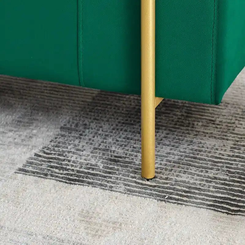 Banc de rangement rembourré avec accoudoirs enroulés et pieds dorés